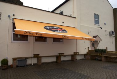Custom Orange Semi Cassette Retractable Awning With Signage And Logo