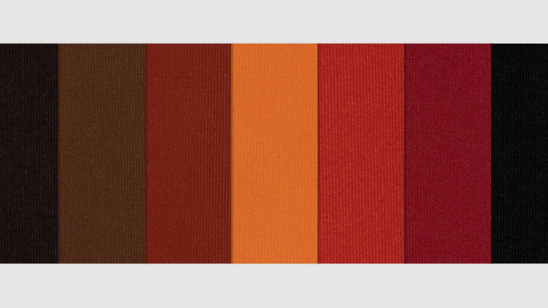 Marine Grade Fabric in cafe, brown, rust, orange, bright red, mid red and black