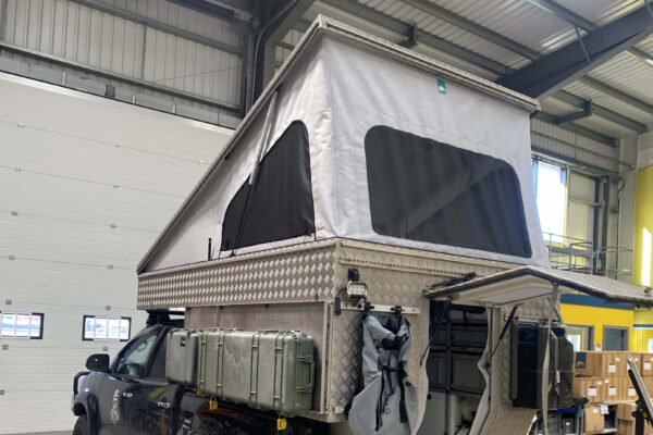 Campervan pop-top on a pickup
